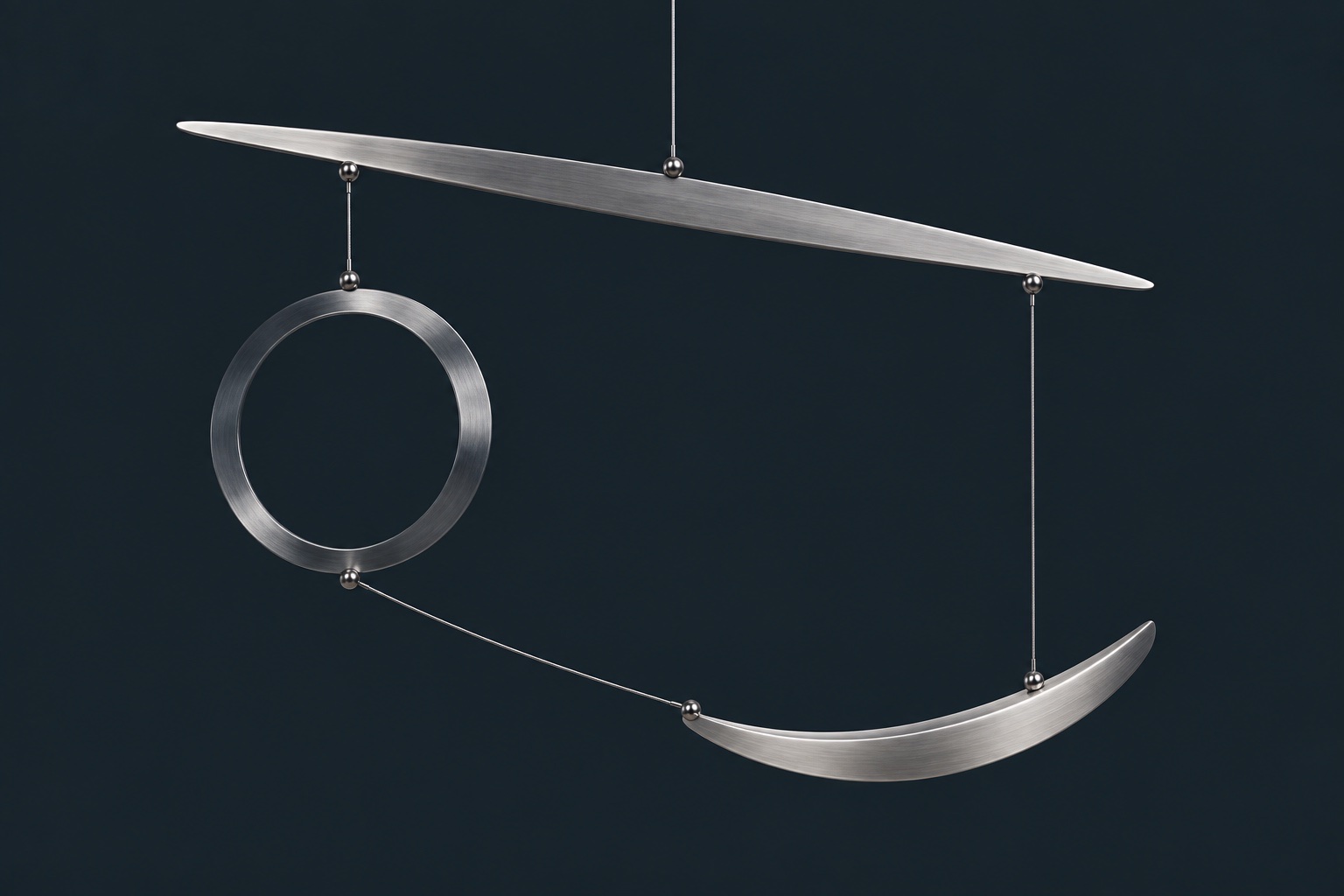 Different metal forms suspended together as a balanced, interconnected mobile.